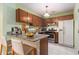 Kitchen with granite countertops, stainless steel appliances, and a breakfast bar at 1908 Brittania Cir, Woodstock, GA 30188
