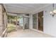 Screened porch attached to the house featuring an outdoor dining area at 1908 Brittania Cir, Woodstock, GA 30188