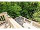 View from the deck overlooking the luscious green backyard at 320 Yellowroot Ln, Sandy Springs, GA 30350