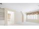 Bedroom with built-in shelving and carpet throughout at 320 Yellowroot Ln, Sandy Springs, GA 30350