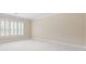 Bright bedroom features plantation shutters and neutral carpeting at 320 Yellowroot Ln, Sandy Springs, GA 30350