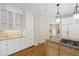 Kitchen with island and granite counters, sink, and stainless appliances at 320 Yellowroot Ln, Sandy Springs, GA 30350