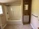 Clean, bright bathroom featuring a tub-shower combo at 389 Dargan Sw Pl, Atlanta, GA 30310