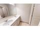 Elegant bathroom with dual sinks, a large mirror, and tiled flooring at 4535 Sunflower Cir, Cumming, GA 30040