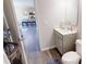 Small bathroom features tile floors, a toilet, and a vanity with a sink at 4535 Sunflower Cir, Cumming, GA 30040