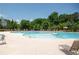 Community pool with ample seating and large trees offering both sun and shade to the residents at 4535 Sunflower Cir, Cumming, GA 30040