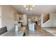 Well-equipped kitchen with modern appliances and an adjacent dining area at 4535 Sunflower Cir, Cumming, GA 30040