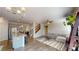Open concept living area with a modern kitchen and comfortable seating at 4535 Sunflower Cir, Cumming, GA 30040