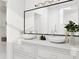 Bright bathroom featuring a double sink vanity, sleek fixtures, and modern lighting, perfect for a relaxing and stylish space at 1161 Dahlonega Hwy # 3, Cumming, GA 30040