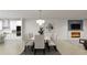 Elegant dining room with stylish seating, modern light fixture, and an adjacent cozy living space at 1161 Dahlonega Hwy # 3, Cumming, GA 30040