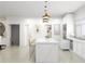 Bright kitchen featuring a large island with seating and modern appliances at 1161 Dahlonega Hwy # 3, Cumming, GA 30040