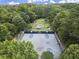 Picture of a basketball court area with a court and picnic tables at 3260 Kingshouse Commons, Johns Creek, GA 30022