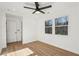 This bedroom includes a ceiling fan and large windows for natural light and fresh air at 3939 Hamilton Mill Rd, Buford, GA 30519