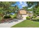 Beautiful single-Gathering home offers mature trees, a well-maintained lawn, and a convenient two-car garage at 4535 Vanadium Bnd, Cumming, GA 30040