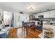 Well-lit kitchen area with stainless appliances, hardwood floors and access to the backyard at 5150 Wheat Ne St, Covington, GA 30014