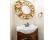 Bathroom with single vanity and a decorative mirror at 1965 Nocturne Dr # 1306A, Alpharetta, GA 30009