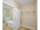 Walk-in closet with shelf, located near the bathroom at 1965 Nocturne Dr # 1306A, Alpharetta, GA 30009