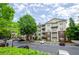 View of the condo complex with a well-maintained parking lot at 1965 Nocturne Dr # 1306A, Alpharetta, GA 30009