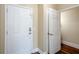 Entryway featuring hardwood floors and a paneled door at 1965 Nocturne Dr # 1306A, Alpharetta, GA 30009