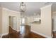 Open living area with hardwood flooring at 1965 Nocturne Dr # 1306A, Alpharetta, GA 30009