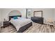 Comfortable bedroom with modern decor and plenty of natural light at 502 Stoneland Pl, Lawrenceville, GA 30046