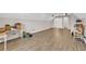 Spacious bonus room with wood-look flooring, plenty of storage, and room to roam at 502 Stoneland Pl, Lawrenceville, GA 30046