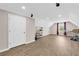 Bright bonus room featuring wood-look floors, a window, recessed lighting, and a closet at 502 Stoneland Pl, Lawrenceville, GA 30046