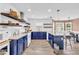 Bright and modern kitchen with stainless steel appliances and an open concept design at 502 Stoneland Pl, Lawrenceville, GA 30046