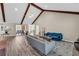 Spacious living room with vaulted ceilings, wood beams, and modern furnishings at 502 Stoneland Pl, Lawrenceville, GA 30046