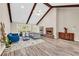 Comfortable living room with fireplace, high ceiling, and wood beams at 502 Stoneland Pl, Lawrenceville, GA 30046