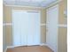 Bedroom with closet and door at 936 Glynn Oaks Dr, Clarkston, GA 30021