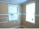 Bright room features neutral walls, white trim, and newer windows at 936 Glynn Oaks Dr, Clarkston, GA 30021