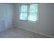 Bright bedroom with a closet and natural light at 936 Glynn Oaks Dr, Clarkston, GA 30021