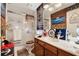 Nautical-themed bathroom with a vanity, decorative elements, and a shower-tub combo at 2080 Bankston Cir, Snellville, GA 30078