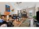 Comfortable living room with a fireplace, wood floors and plenty of seating space at 2080 Bankston Cir, Snellville, GA 30078