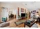Open concept living room with vaulted ceilings flowing into the dining area at 2080 Bankston Cir, Snellville, GA 30078