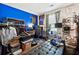 Home office featuring a blue accent wall, work space, and a modern design at 2080 Bankston Cir, Snellville, GA 30078