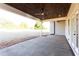 Outdoor patio features a stained wood ceiling and ceiling fan at 269 Highway 11, Social Circle, GA 30025