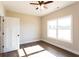 Bedroom featuring a ceiling fan and large bright window at 269 Highway 11, Social Circle, GA 30025