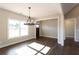 Entryway with dark hardwood floors, neutral walls, and lots of natural light at 269 Highway 11, Social Circle, GA 30025