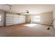 Spacious two car garage with light walls and natural light at 269 Highway 11, Social Circle, GA 30025