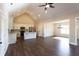 Open concept living space featuring hardwood floors, modern kitchen, and dining area at 269 Highway 11, Social Circle, GA 30025
