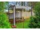 Shaded pergola with a picnic table in the backyard, creating a cozy outdoor retreat at 4365 Wicklow Ct, Suwanee, GA 30024