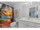 Bathroom with tropical themed shower curtain and white vanity at 4365 Wicklow Ct, Suwanee, GA 30024