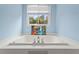 Large tub with garden view at 4365 Wicklow Ct, Suwanee, GA 30024