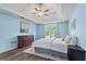 This spacious bedroom features a trey ceiling, wood-look floors and large windows at 4365 Wicklow Ct, Suwanee, GA 30024