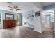 Bedroom with wood-look floors, dark wood dresser and light blue painted walls at 4365 Wicklow Ct, Suwanee, GA 30024