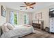 Comfortable bedroom with starfish decor and lots of light at 4365 Wicklow Ct, Suwanee, GA 30024