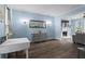 Cozy living room area seamlessly opens into the Gathering area creating an easy traffic pattern in the home at 4365 Wicklow Ct, Suwanee, GA 30024