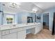 Elegant main bathroom with double vanity and bright natural light at 4365 Wicklow Ct, Suwanee, GA 30024